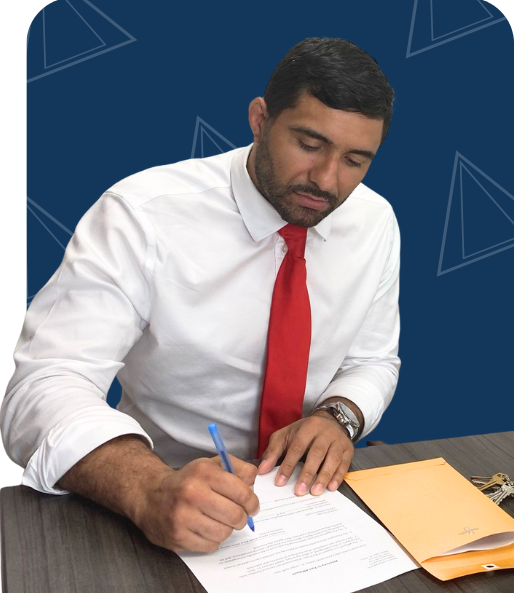 Attorney Arno Lemus writing legal documents